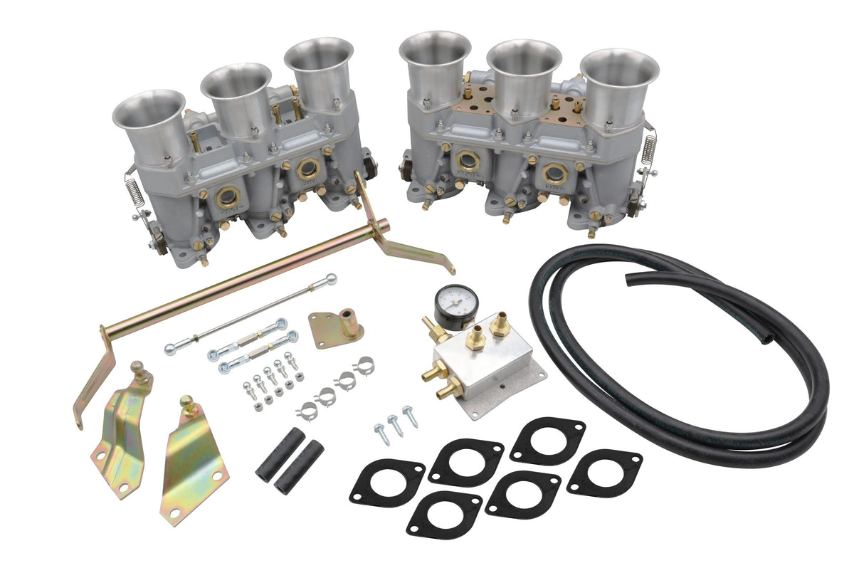 Complete PMO Induction carburetor kit — matched pair with throttle linkage, fuel block, gauge, hoses and gaskets